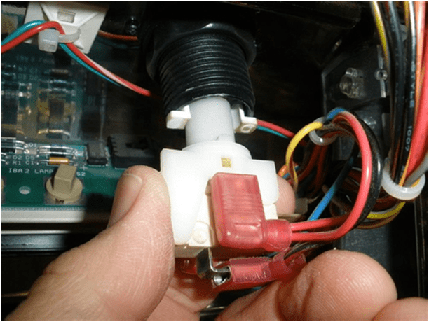 Changing the push button bulbs